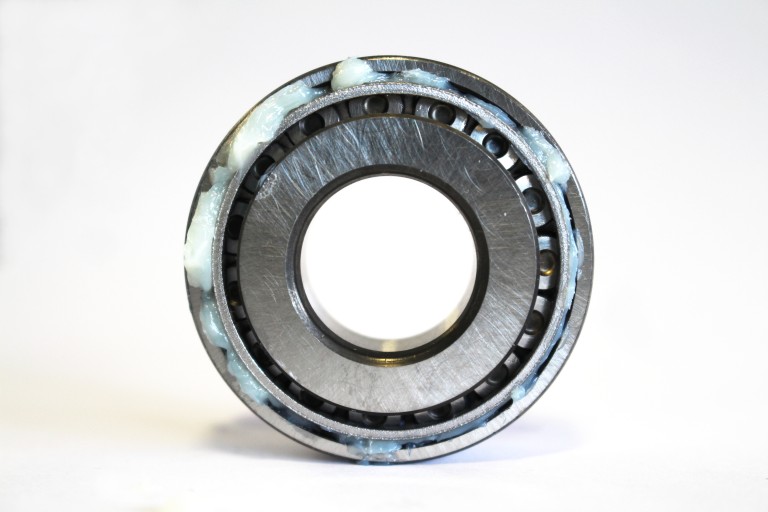 Grasas inertes de fluorocarbono Un rodamiento lubricado con grasa de jabón compleja de aluminio blanco